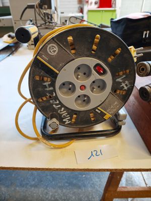 a reel that is sitting on a table in a room