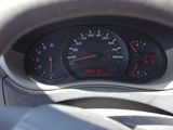 a close up of a car dashboard with a speedometer