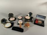 a lot of makeup items that are on a table