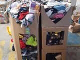a carton full of clothes and other items in a warehouse