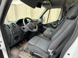 the interior of a van with the door open and the driver ' s seat down