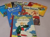 de nombreux livres pour enfants qui se trouvent sur la table