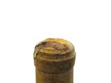 a small bottle of wine that is sitting on a table