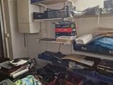 a cluttered room with a lot of clutter on the floor
