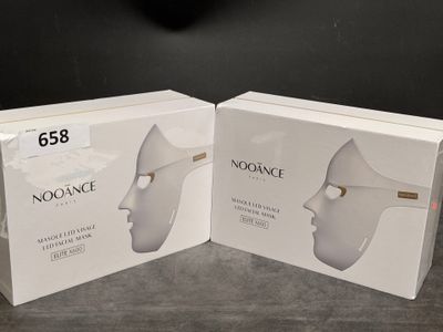 two boxes of noosance facial care products on a table
