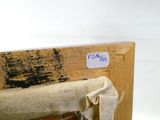 une photo d'un morceau de bois sur lequel est posé un morceau de tissu