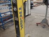 an image of a fork lift in a warehouse