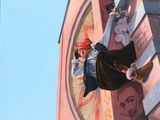 a painting of a pirate hanging from a building