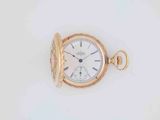 an image of a gold pocket watch on a white surface