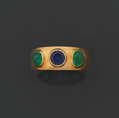 Bague jonc en or jaune 18K 750 millièmes sertie de deux émer…