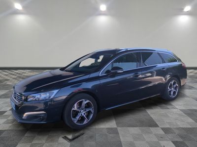 a picture of a blue car parked in a garage