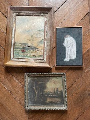 three paintings on the floor next to each other