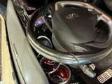 a steering wheel in the center of a car