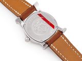 wrist watch with brown leather strap and silver case with red stripe
