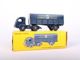 a toy truck that is sitting on top of a box