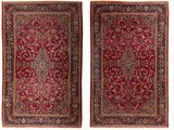 a pair of persian rugs