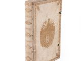 an old book with a picture of a lion on the cover