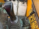 a close up of a control panel in a construction vehicle