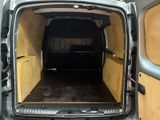 the back of a van with the door open and the inside of it