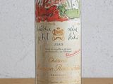 a bottle of wine that is sitting on a table