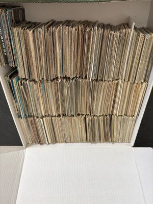 a box full of old records sitting on a table