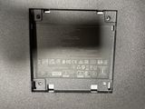 a close up of a laptop battery in a box
