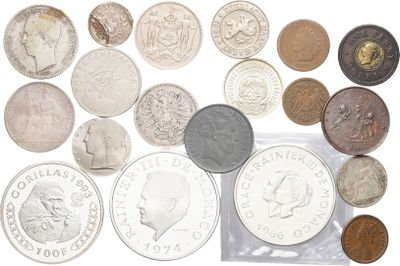 many different coins in a bag on the table