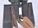 a pair of binoculars that have a tag on them