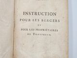 an old book opened to reveal a page of instructions on how to use it