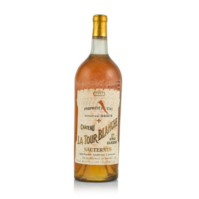 a bottle of liquor sitting on top of a white surface