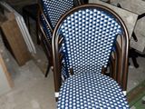 three chairs that are sitting in a room