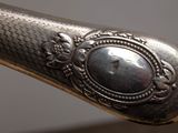 a close up of a metal object with a picture on it