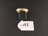 a close up of a ring on a black surface with a price tag