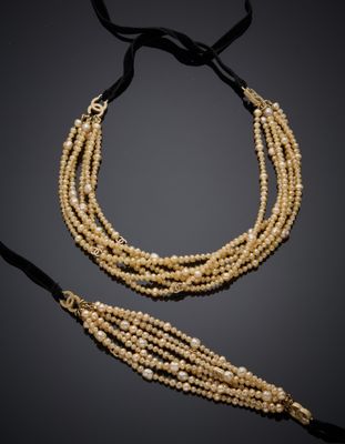un ensemble composé d'un collier et d'un bracelet en or et perles