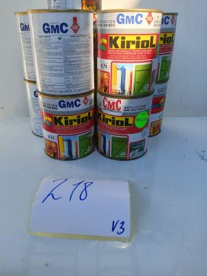 two cans of canned food on a table with a price tag