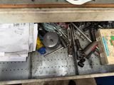a table with a bunch of tools on top of it