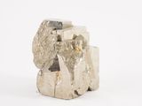 a piece of rock that is sitting on top of a white surface