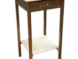a small table with a marble top on a white background