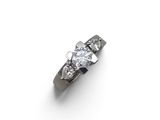 an image of a diamond three stone ring on a white background