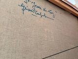 a picture of a piece of art with writing on it