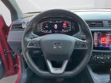 a dashboard of a car with a steering wheel and a dash board