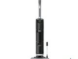a close up of a black and silver vacuum cleaner on a white background