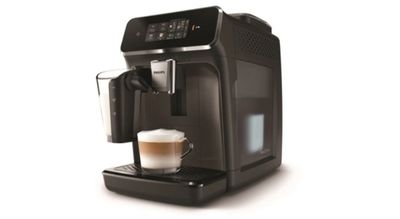 a close up of a coffee machine on a white surface