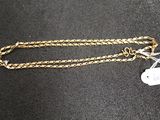 a close up of a chain with a tag attached to it