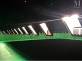 many lights that are on in a green room