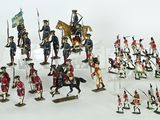 a lot of figurines of soldiers that are on display