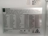 a picture of a sign on the side of a refrigerator