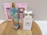a bottle of perfume and a box of soap on a table