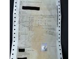 an image of a paper with a picture of a person ' s name on it