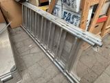 a metal barricade that has been placed on the ground